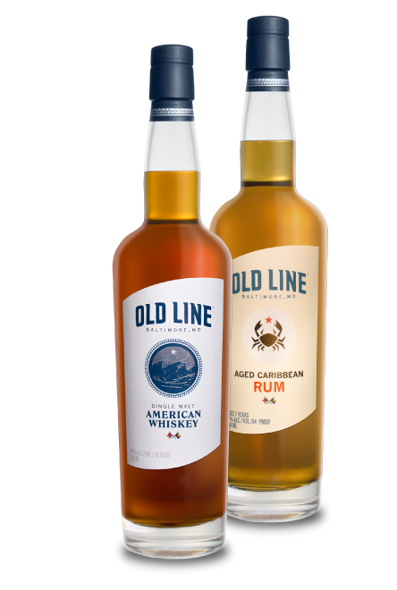 Old Line Single Malt Whiskey And Aged Caribbean Rum Bottles